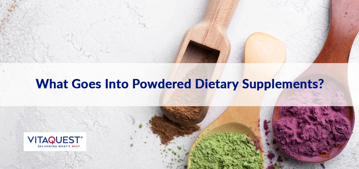 three wooden spoons holding different colored dietary supplement powders
