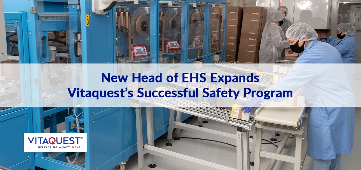 Technician overseeing automated packaging equipment in a Vitaquest facility