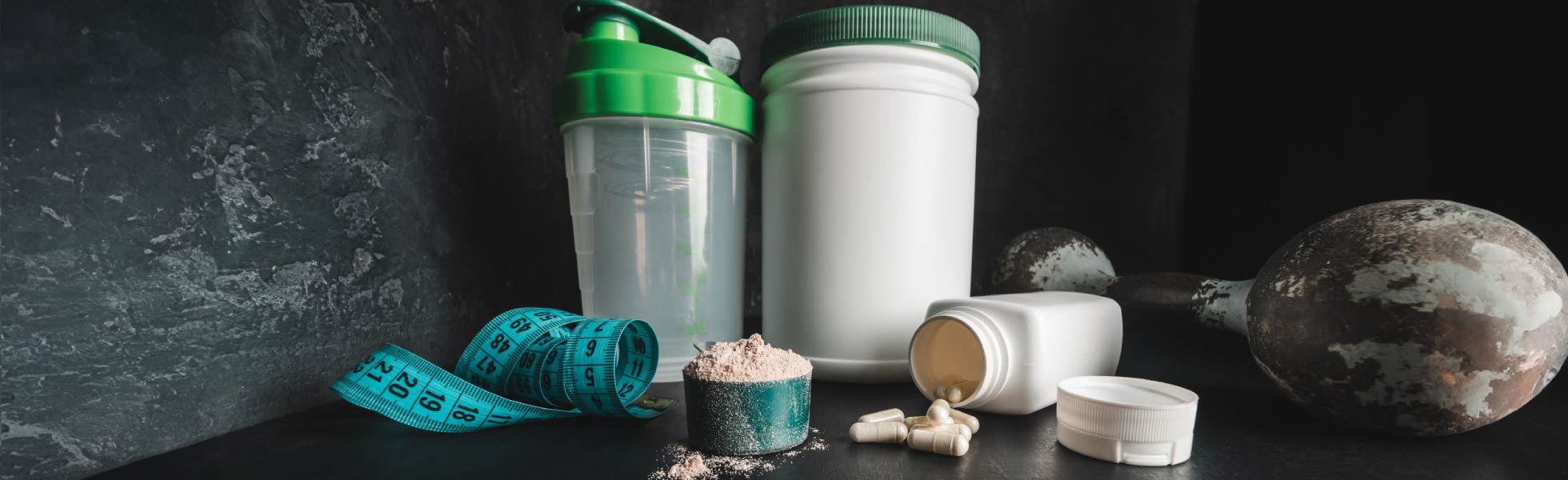 Sports supplement, creatine, hmb, bcaa, amino acid or powdered vitamin. Sports nutrition concept.